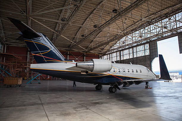 istock Business jet airplane stays in hangar. 538681595