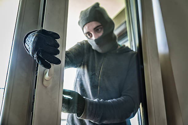 istock Burglar breaking into a house 538681816