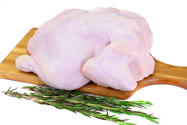 istock The Split Carcass of Raw Chicken. Isolated on White. 538681970