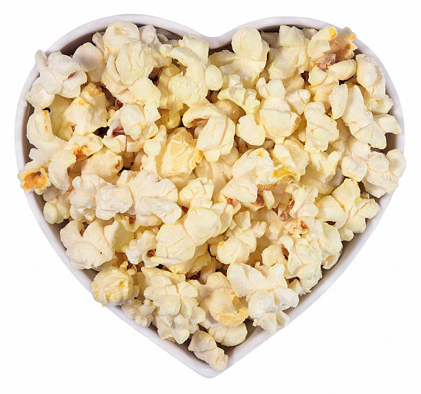 istock Fresh popcorn in plate in the form of heart 538683279