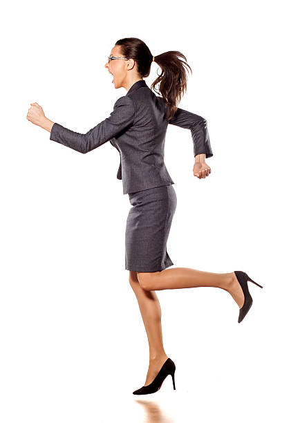 istock Young beautiful business woman running 538683459