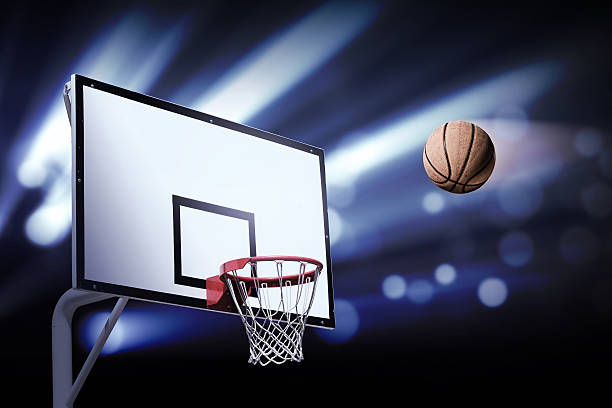 istock Basketball heading the hoop with spotlights 538685569