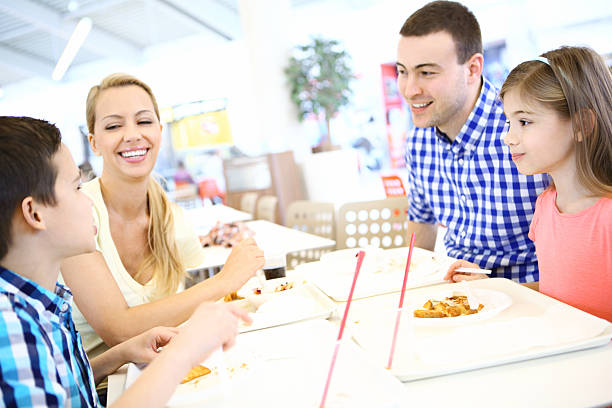 istock Young family having lunch in restaurant. 538686731