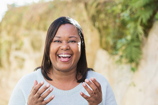 istock Cheerful black woman talking to the camera 538686901