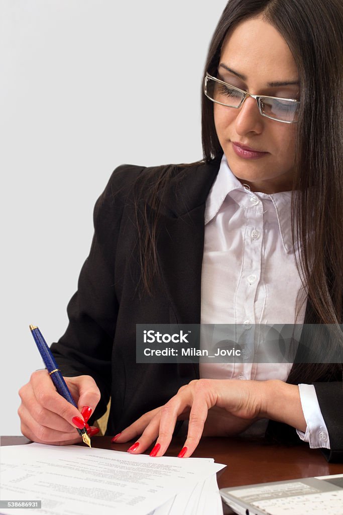 Businesswoman writting 2015 Stock Photo