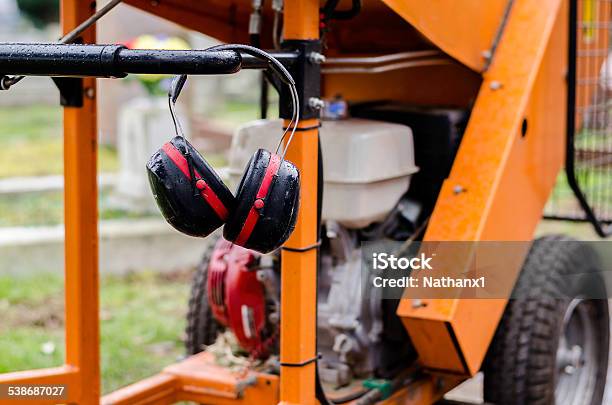 Wood Chipping Machine And Ear Defenders Colour Image Stock Photo - Download Image Now