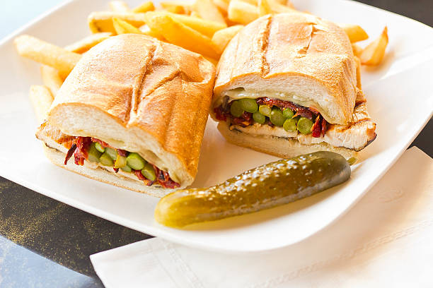 Helsinki Grilled Chicken Sandwich Nutritious Helsinki grilled chicken sandwich with asparagus and sundried tomatoes torpedo sandwich stock pictures, royalty-free photos & images