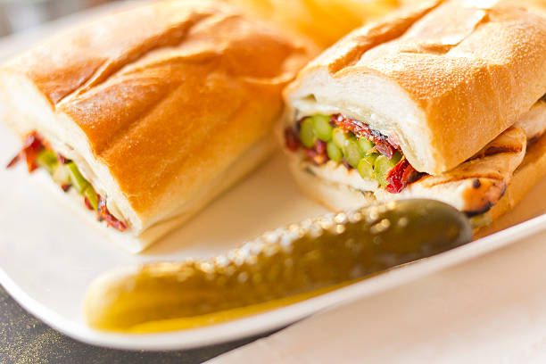 Helsinki Grilled Chicken Sandwich Nutritious Helsinki grilled chicken sandwich with asparagus and sundried tomatoes torpedo sandwich stock pictures, royalty-free photos & images
