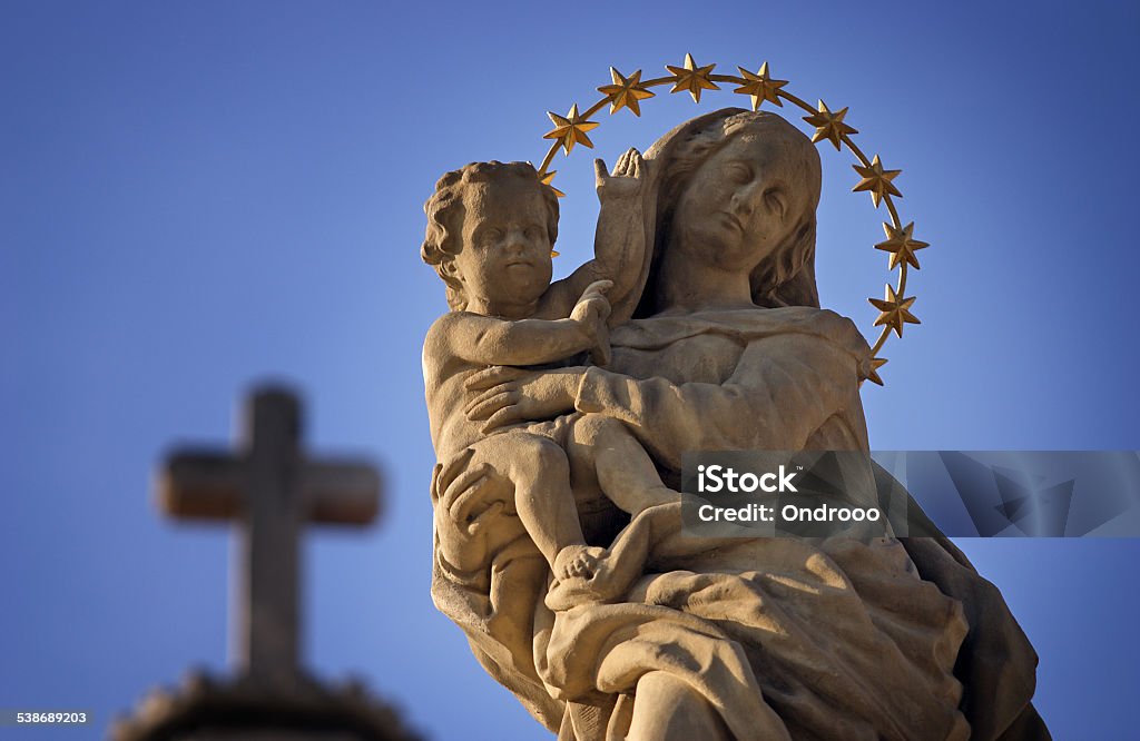 Statue of Virgin Mary and Jesus Statue of Virgin Mary and Jesus from the cross sky background Virgin Mary Stock Photo