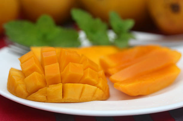 istock Ripe mangoes with mint leaves 538689983