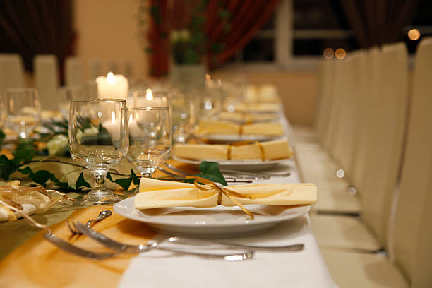 istock catering table  with served plates and wine glasses 538690305