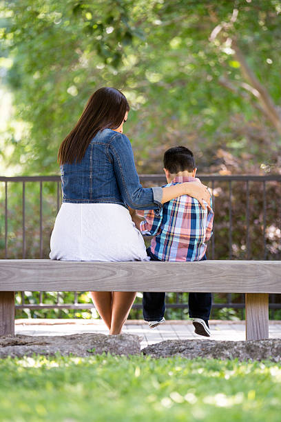 istock Mom and son in park 538702539