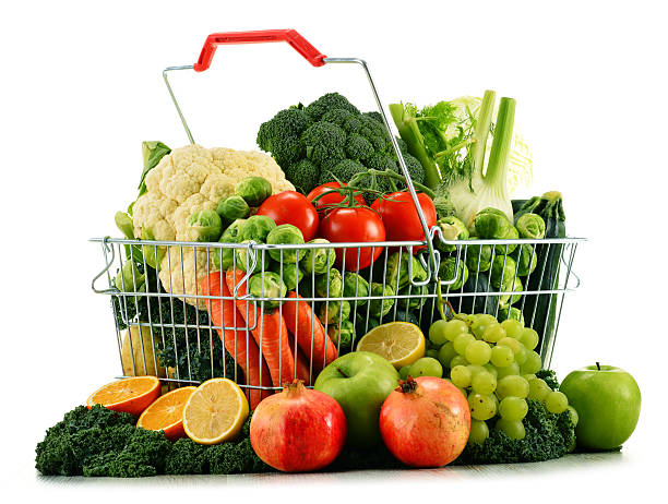 istock Shopping basket with assorted raw organic vegetables over white 538703685