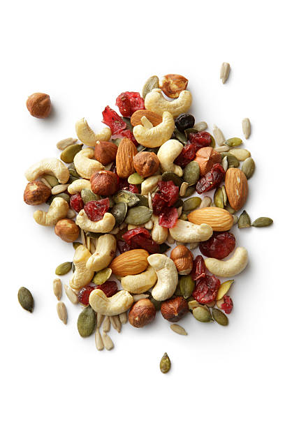 dadi: trail mix - nut snack fruit healthy eating foto e immagini stock