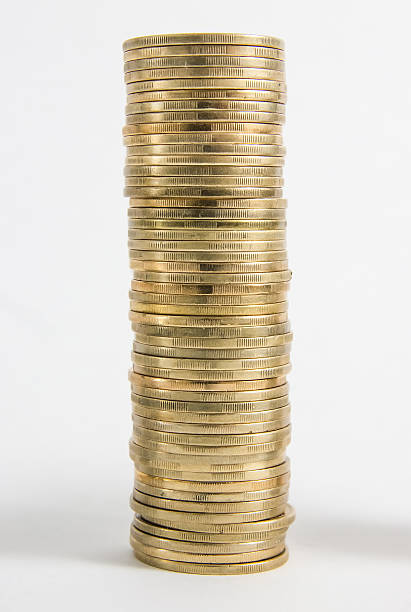 istock Columns of coins isolated on white background 538705297