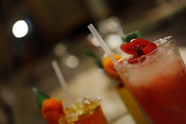 istock red cocktail in bokeh background 538709025
