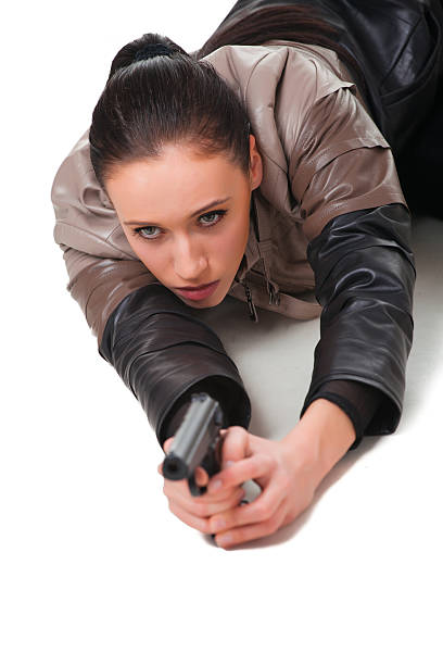 istock Beautiful sexy girl with gun 538721191