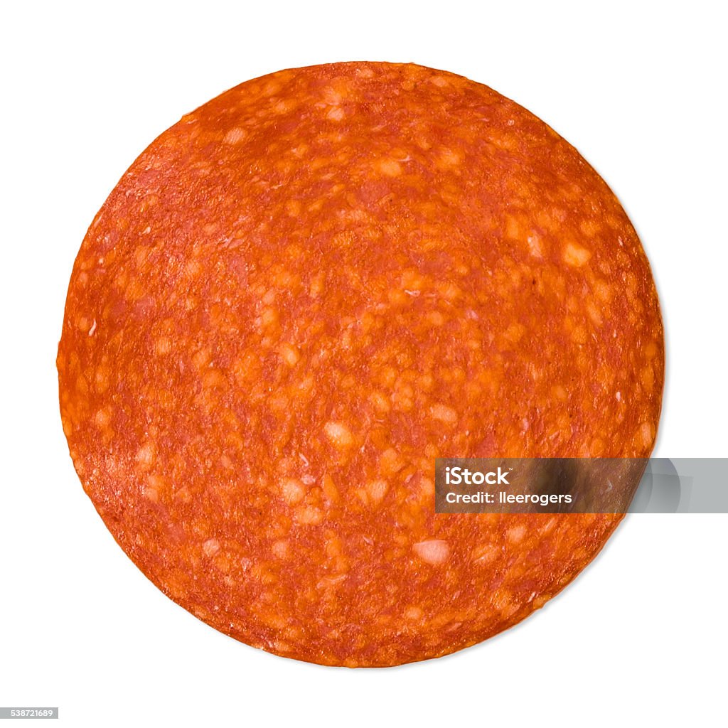 Slice Of Pepperoni On A White Background Stock Photo - Download Image