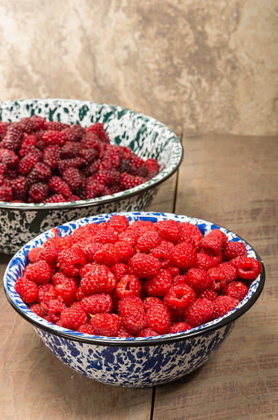 istock Bowls of red raspberries and tayberries 538724967