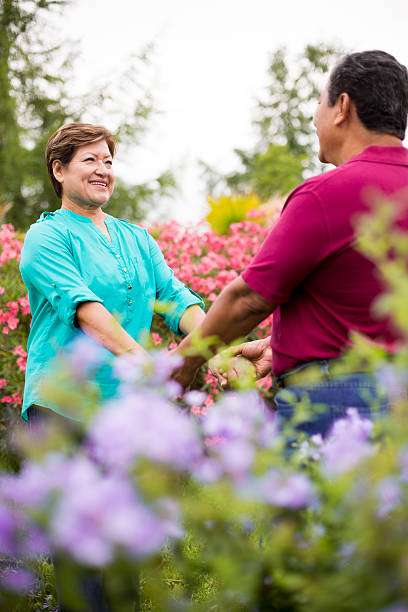 istock Elderly couple in love in park 538725105