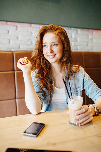 istock Young woman in cafe 538725891