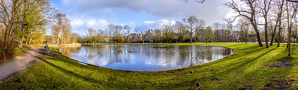 istock Pond panoramic landscape photo in Vondelpark, Amsterdam. 538727195