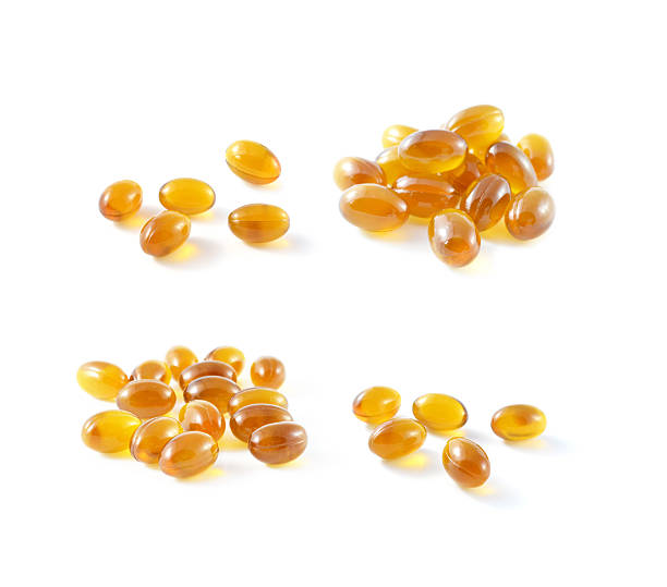 istock Cod liver oil omega 3 gel capsules  on white 538728407