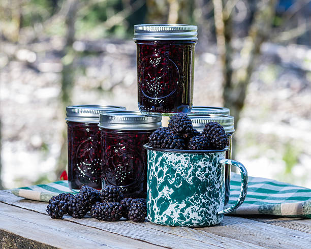 Homemade marionberry jam or preserves Jars of homemade marionberry or blackberry preserves or jam marionberry stock pictures, royalty-free photos & images