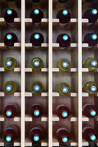 istock Wooden shelves with wine bottles 538746049