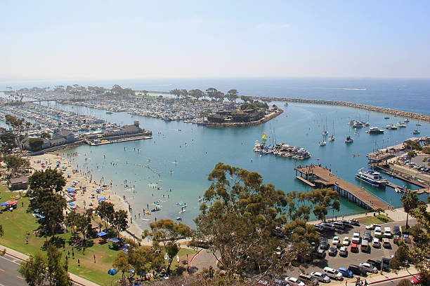 Dana Point Harbor Dana Point Harbor, located in Southern California, is home to a marina, shops, and restaurant. It is point of departure for the Catalina Express, a transportation service to and from Catalina Island. dana point stock pictures, royalty-free photos & images