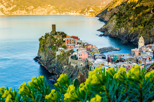 Vernazza, sunset from a hill over the beautiful town in the ligurian sea coast, Italy