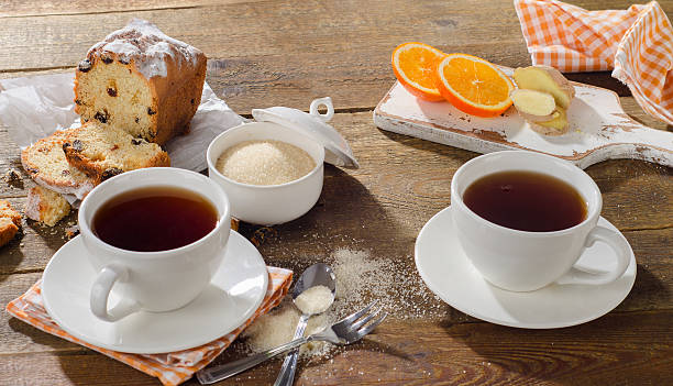 istock Cups of tea with sweet cake, ginger 538767954