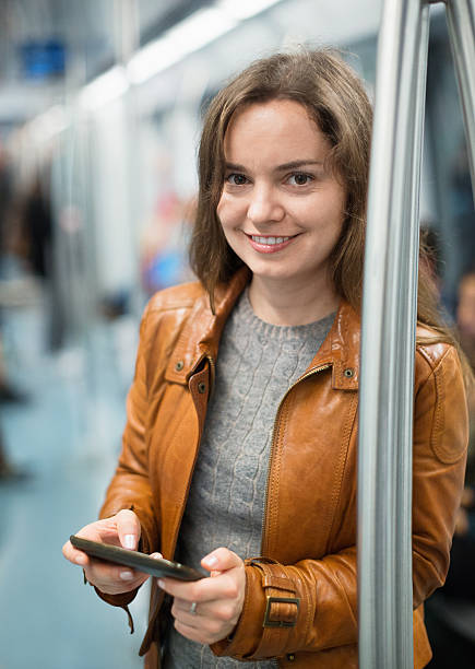 istock Young positive girl reading from mobile phone screen 538768604