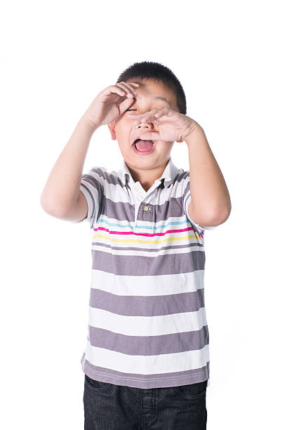 istock Asian boy sad and crying isolated 538771553