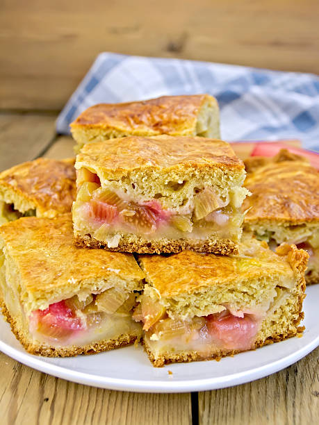 Pie rhubarb in plate and napkin on board