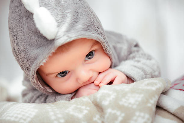 istock Adorable little baby in a funny bodysuit 538773153
