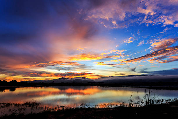 istock Beautiful sky with reflection in the water 538773928