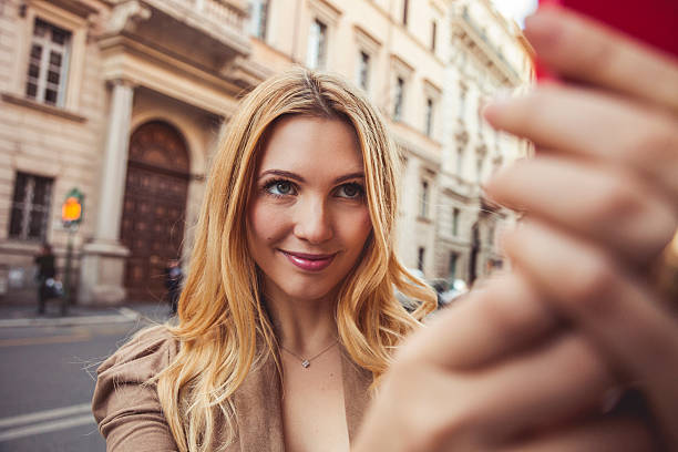 istock Young woman taking a selfie 538774425