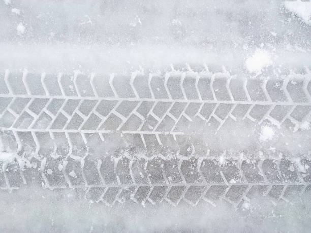 istock Car tracks in the snow. 538774927