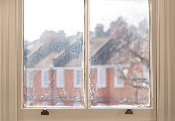 istock View through an old window frame of a victorian house 538775175