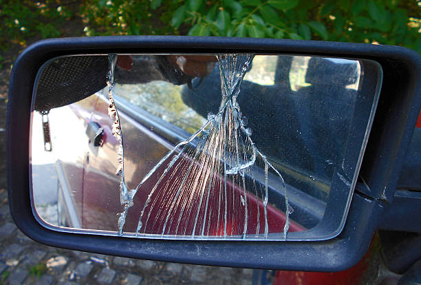 Broken Side-View Mirror Broken and damaged Side-View Mirror on the old car broken side view mirror stock pictures, royalty-free photos & images