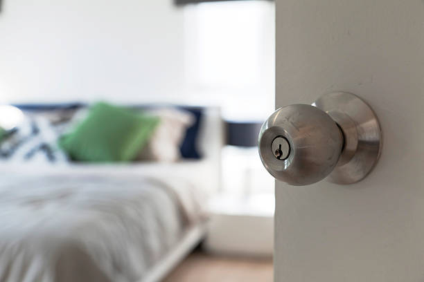 istock door knob to another room 538776652