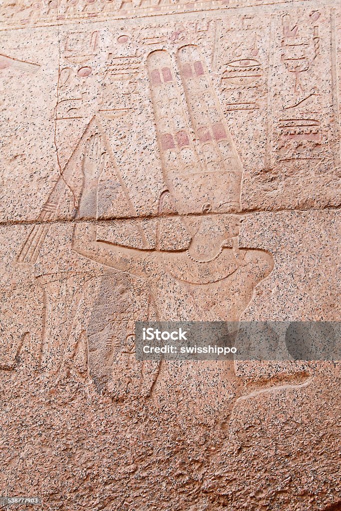 Hieroglyphs on the wall Egyptian stone carving on the wall 2015 Stock Photo