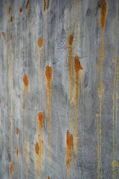 istock old green brown surface and concrete wall with rusted spots 538778360