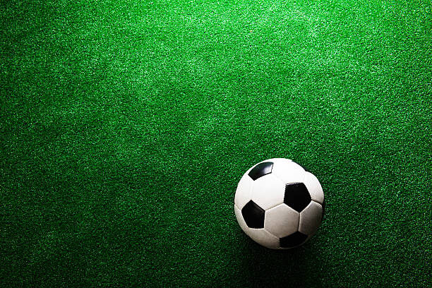 istock Soccer ball against artificial turf. Studio shot. Copy space. 538778362