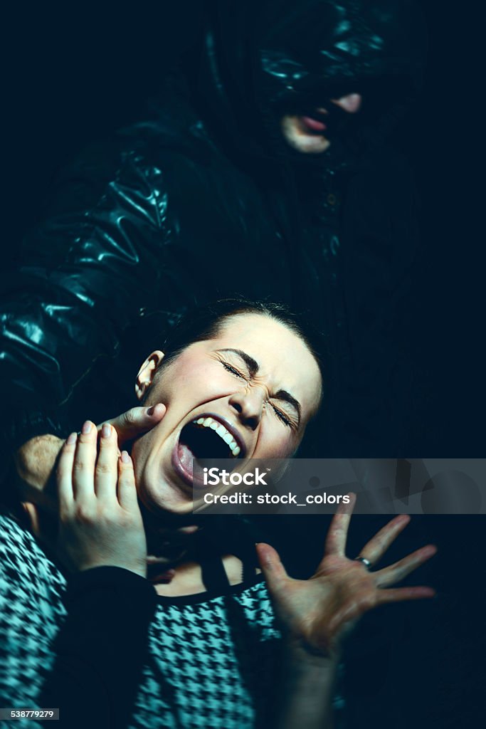 screaming for domestic violence screaming and terrified woman, man beating her. 2015 Stock Photo