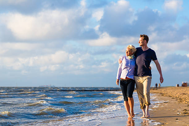 istock Couple take a walk at German north sea beach 538780498