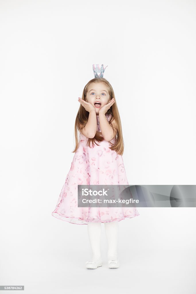 Full body portrait of girl child with blond hair Full body portrait of cute little girl child with blond hair and pink dress isolated on white background Princess Stock Photo