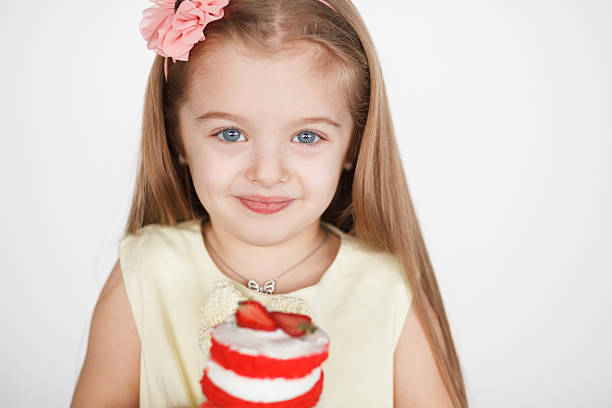 istock Little girl celebrating her birthday. 538784330