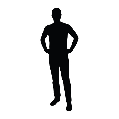 Man standing in shirt and jeans with hands on hips. Silhouette of man standing. Front view